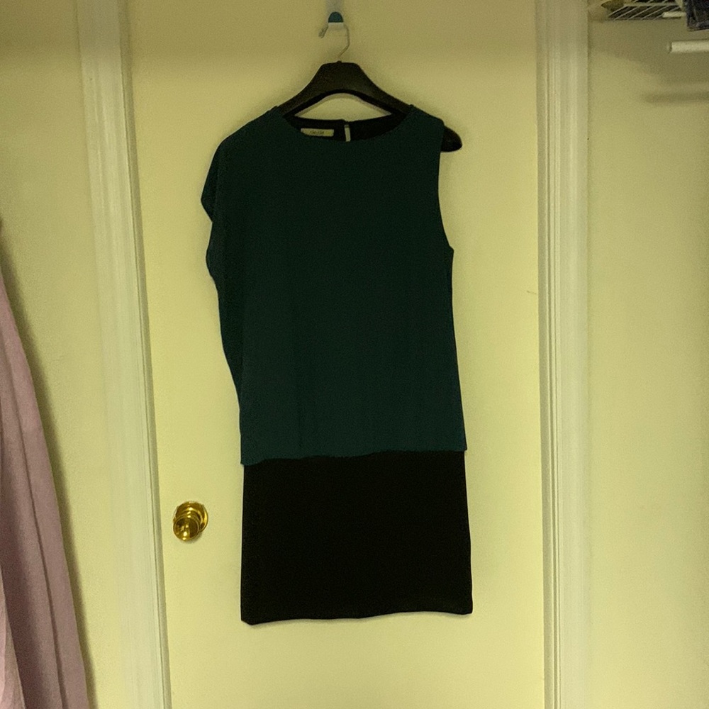 Italian made-dress, short sleeve on one side, cap sleeve on the other side,